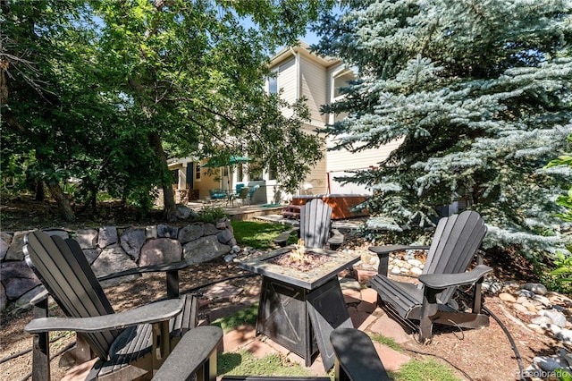 view of yard with a patio area and a fire pit