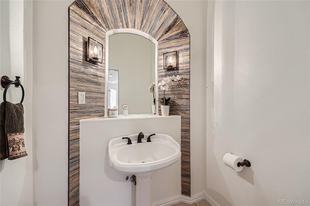 bathroom featuring baseboards