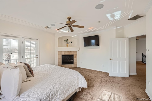 carpeted bedroom featuring access to exterior, visible vents, and crown molding