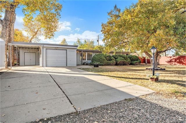 ranch-style home featuring a garage