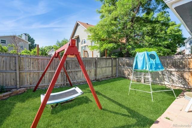 4218 E Flanders St, Denver, CO 80249 - view of jungle gym with a fenced backyard