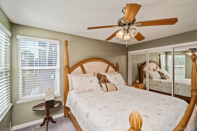 4218 E Flanders St, Denver, CO 80249 - carpeted bedroom featuring a textured ceiling, ceiling fan, and a closet