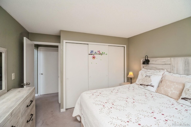 4218 E Flanders St, Denver, CO 80249 - bedroom featuring light colored carpet and a closet