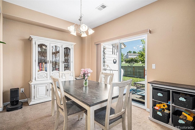 23235 York Ave, Parker, CO 80138 - dining area with a chandelier and light colored carpet