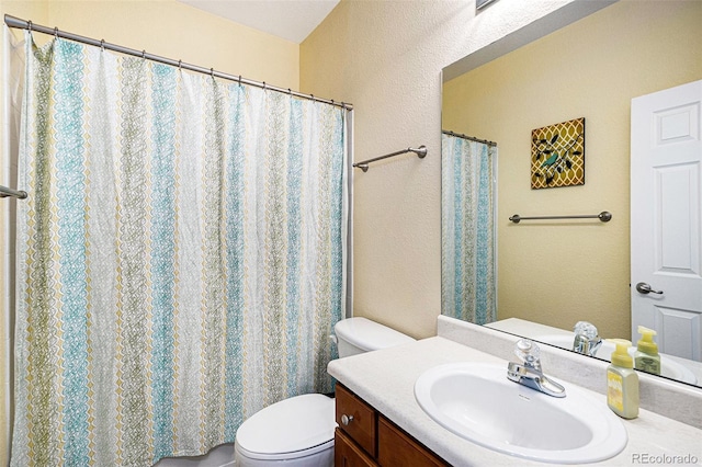23235 York Ave, Parker, CO 80138 - full bathroom featuring vanity, a textured wall, and a shower with curtain