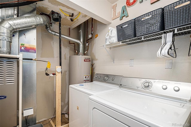 23235 York Ave, Parker, CO 80138 - laundry area with gas water heater, separate washer and dryer, and heating unit