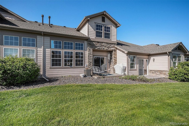 23235 York Ave, Parker, CO 80138 - back of house featuring stone siding, a yard, a patio area, and roof with shingles