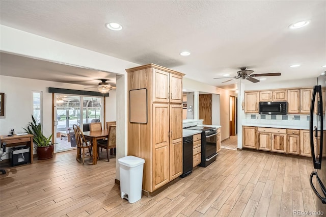 10223 W 77th Dr, Arvada, CO 80005 - kitchen featuring black appliances, a ceiling fan, light wood-style flooring, light brown cabinetry, and recessed lighting