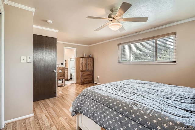 10223 W 77th Dr, Arvada, CO 80005 - bedroom featuring light wood-style floors, crown molding, a ceiling fan, and ensuite bath