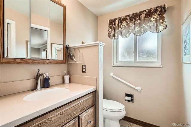 10223 W 77th Dr, Arvada, CO 80005 - bathroom featuring vanity and toilet