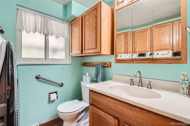 10223 W 77th Dr, Arvada, CO 80005 - bathroom featuring toilet and vanity