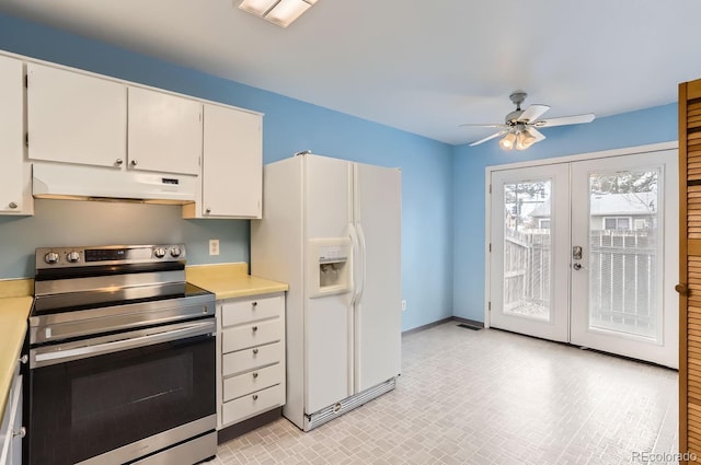 kitchen with white cabinetry, white fridge with ice dispenser, french doors, ceiling fan, and stainless steel range with electric cooktop