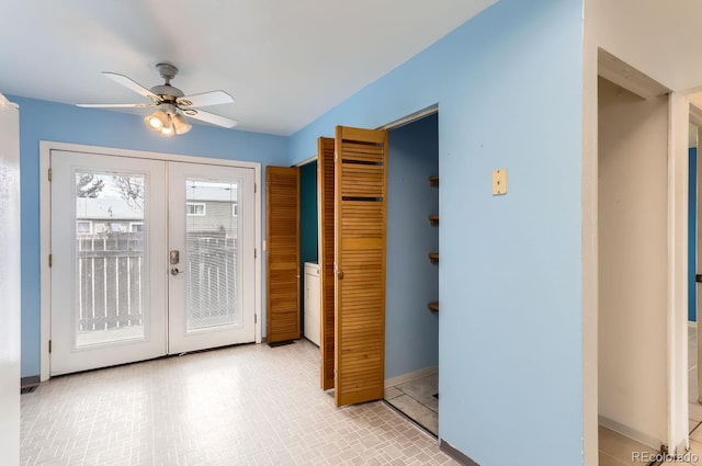 doorway featuring ceiling fan, french doors, and light tile patterned flooring