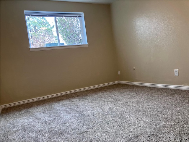 16359 W 10th Ave Unit Yy2, Golden, CO 80401 - spare room featuring carpet floors and baseboards