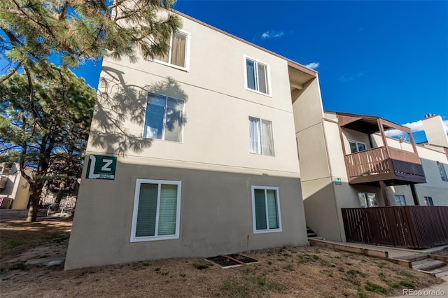 exterior space featuring stucco siding