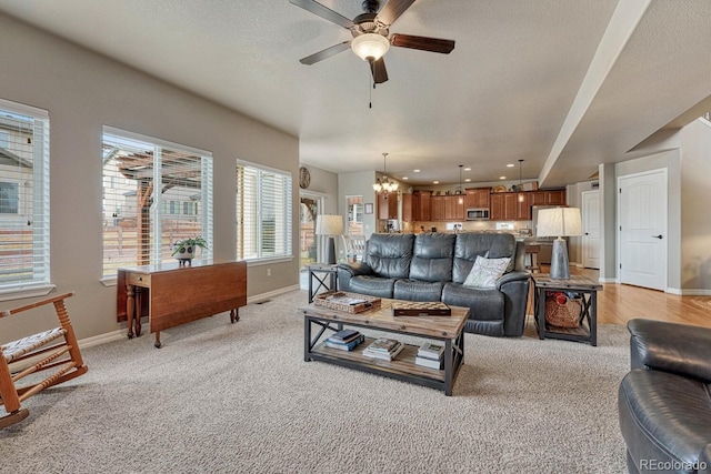 6132 Cubbage Dr, Colorado Springs, CO 80924 - living area with ceiling fan with notable chandelier, recessed lighting, baseboards, and a textured ceiling