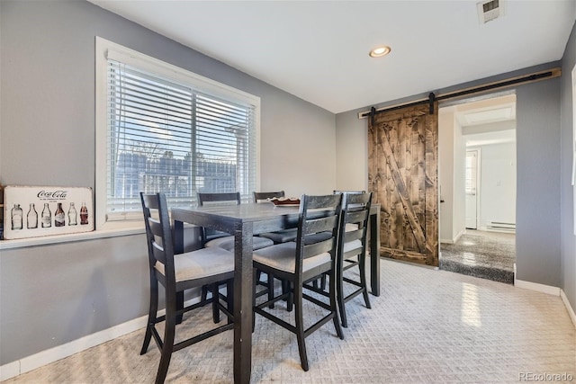 carpeted dining area featuring baseboards, visible vents, a baseboard radiator, recessed lighting, and a barn door