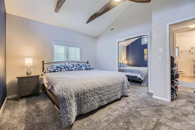 carpeted bedroom featuring visible vents, beam ceiling, baseboards, and ceiling fan