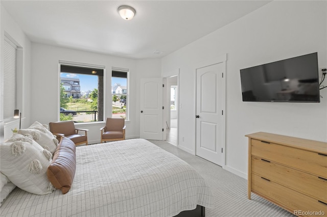 16722 Shoshone St, Broomfield, CO 80023 - bedroom with baseboards and light carpet
