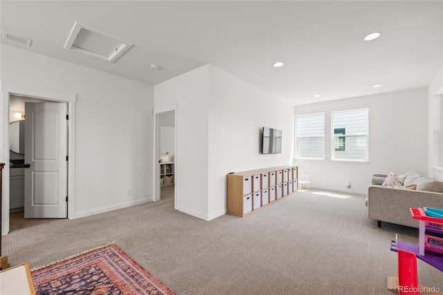 16722 Shoshone St, Broomfield, CO 80023 - living area featuring carpet, baseboards, and recessed lighting