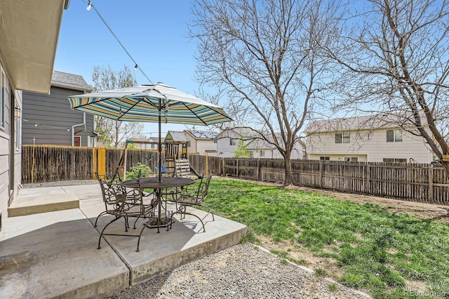 4620 E 135th Way, Thornton, CO 80241 - view of yard featuring a patio area, a playground, and outdoor dining area