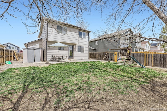 4620 E 135th Way, Thornton, CO 80241 - back of house featuring a playground and a patio