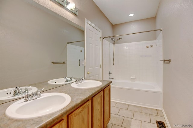 bathroom with shower / bathing tub combination, vanity, and tile patterned floors