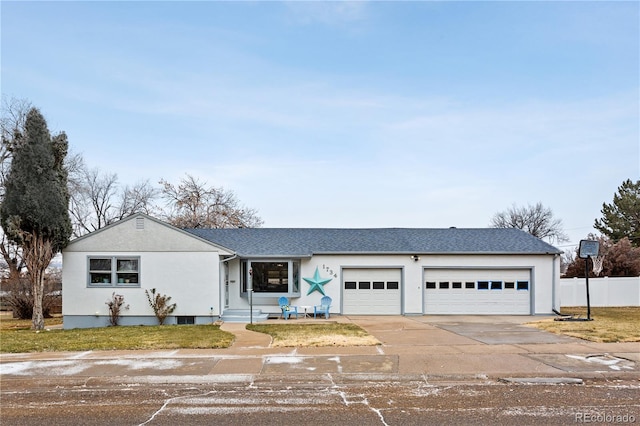 ranch-style house featuring a garage