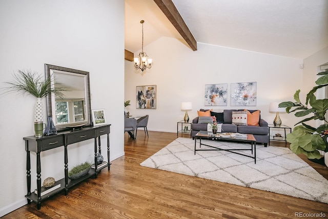 living area featuring baseboards, vaulted ceiling with beams, an inviting chandelier, and wood finished floors