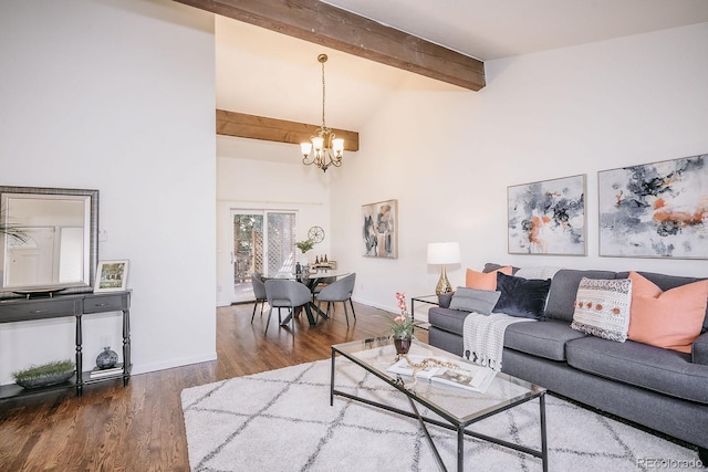 living room with wood finished floors, baseboards, high vaulted ceiling, beamed ceiling, and a chandelier