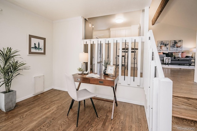 office with baseboards, wood finished floors, and ornamental molding