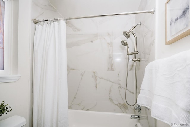 bathroom featuring toilet and shower / tub combo with curtain