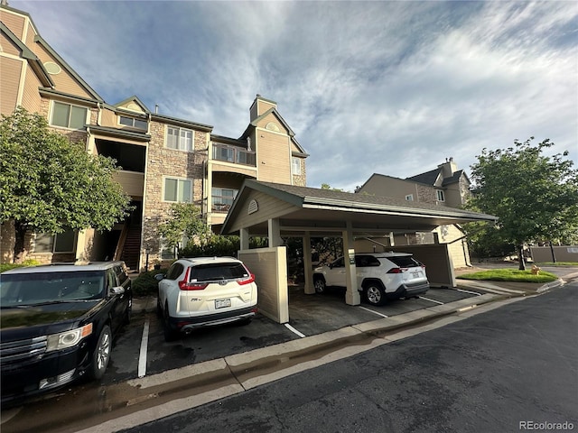 7355 S Alkire St Unit 203, Littleton, CO 80127 - view of partially covered parking lot