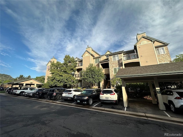 7355 S Alkire St Unit 203, Littleton, CO 80127 - view of property with uncovered parking