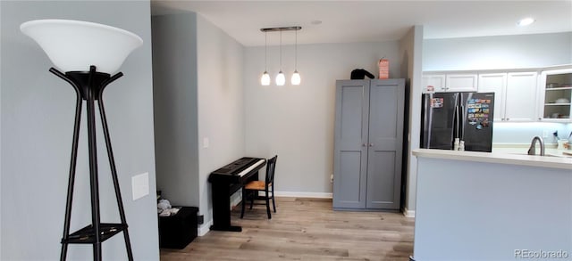 7355 S Alkire St Unit 203, Littleton, CO 80127 - dining space featuring light wood finished floors