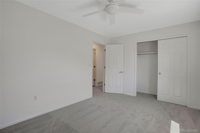 6054 W Adriatic Pl, Lakewood, CO 80227 - unfurnished bedroom with carpet floors, baseboards, a closet, and a ceiling fan
