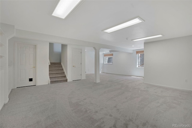 6054 W Adriatic Pl, Lakewood, CO 80227 - basement with carpet floors and stairway