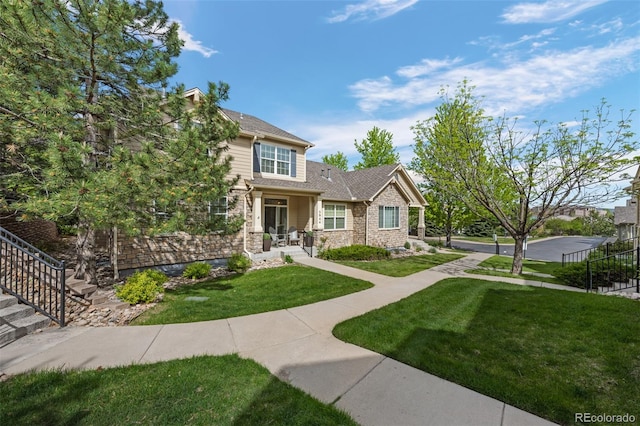 5944 S Yank Ct, Littleton, CO 80127 - view of front facade with a front yard and stairs