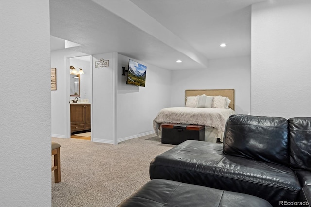5944 S Yank Ct, Littleton, CO 80127 - carpeted bedroom featuring baseboards, recessed lighting, a sink, and ensuite bath