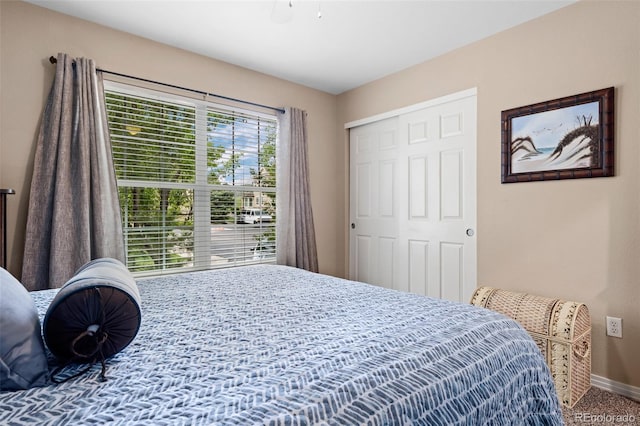 5944 S Yank Ct, Littleton, CO 80127 - carpeted bedroom featuring baseboards and a closet