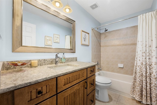 5944 S Yank Ct, Littleton, CO 80127 - bathroom featuring tile patterned floors, shower / bathtub combination with curtain, vanity, and toilet