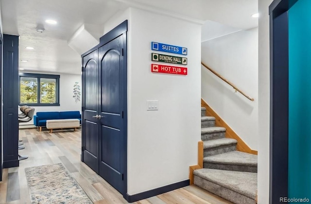 142 High Point Dr, Breckenridge, CO 80424 - hall with stairs, light wood-type flooring, and recessed lighting