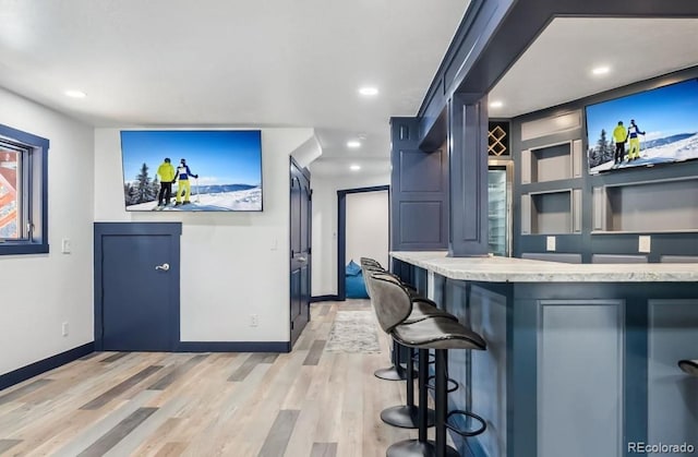 142 High Point Dr, Breckenridge, CO 80424 - bar with baseboards, light wood finished floors, and recessed lighting