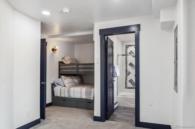142 High Point Dr, Breckenridge, CO 80424 - carpeted bedroom with baseboards and ensuite bath