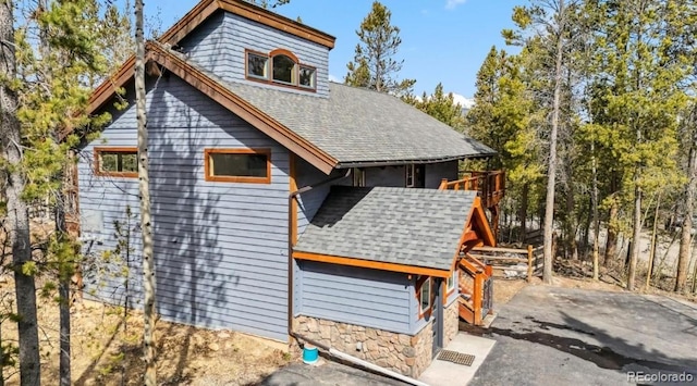 142 High Point Dr, Breckenridge, CO 80424 - view of property exterior featuring roof with shingles