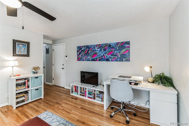 office area featuring hardwood / wood-style flooring and ceiling fan