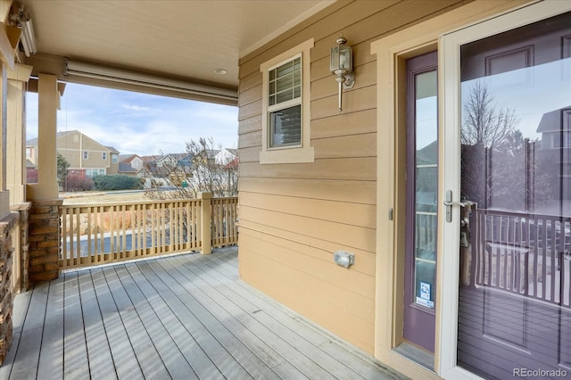 wooden deck featuring a porch