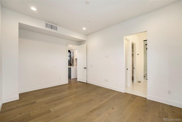 empty room featuring hardwood / wood-style floors