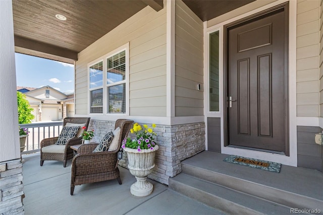 1177 Man O War Way, Colorado Springs, CO 80921 - view of exterior entry with a porch and stone siding