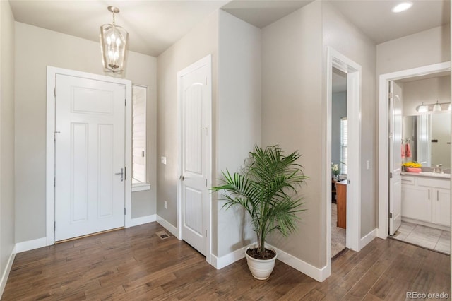 1177 Man O War Way, Colorado Springs, CO 80921 - entryway featuring wood finished floors and recessed lighting